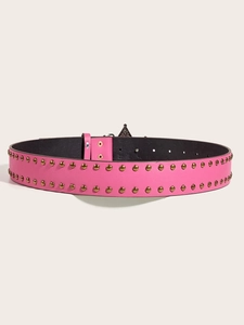 Detail of pink leather belt featuring double-row gold round rivets and metal buckle
