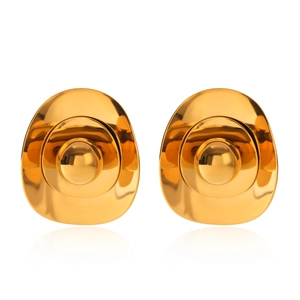 Detailed macro view of triple-layered irregular golden metal earrings with mirror polish