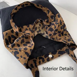 Leopard print canvas tote bag featuring internal zipper pocket and magnetic snap closure