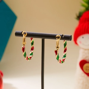 Christmas gold twist hoop earrings with red and green enamel spiral festive design