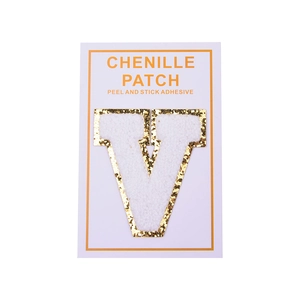 Detail of white chenille letter V patch with gold glitter edge and adhesive backing