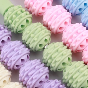 Rouleau de massage aux billes de silicone colorées pour la détente musculaire des jambes