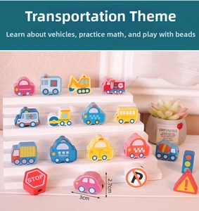 Close-up of transport-themed wooden beads with taxi, school bus, and police car designs