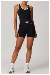 Cross high waist black yoga set with white trim featuring V-cut waist and racerback top