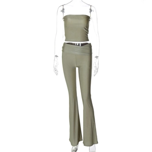 Close-up of olive green tube top and high waist flared pants in elastic knit fabric