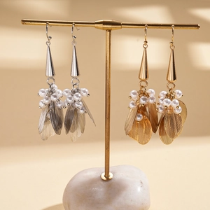 Faux pearl water drop earrings with vintage hollow mesh petals in gold and silver finish