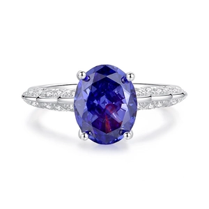 S925 Sterling silver angel wing ring featuring an oval blue stone and white diamonds
