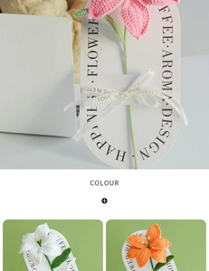 Detail of handmade crochet lily flowers in pink and white attached to gift cards