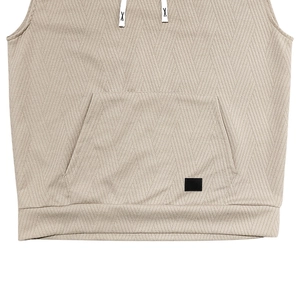 Vue détaillée du tricot jacquard kaki sur un sweat à capuche sans manches avec poche