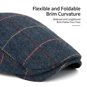 Navy herringbone flat cap for men with adjustable brim and warm wool tweed fabric