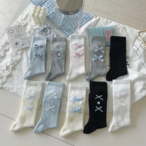 Ballet core ribbon bow mid-calf socks in diverse colors on decorative lace background