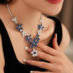 Luxury blue zircon flower pendant necklace and earrings set for elegant evening wear