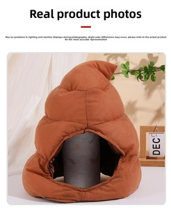 Close-up of funny brown poop plush hat with soft fabric texture on display stand