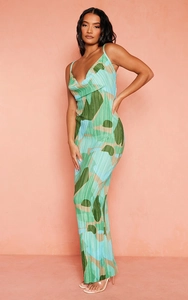 Detail of cowl neck design on a slim fit maxi dress with green marble print and pleated fabric