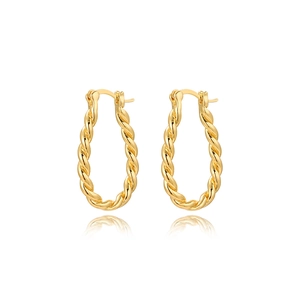 Macro detail of gold-plated twisted rope oval hoop earrings with mirror reflection