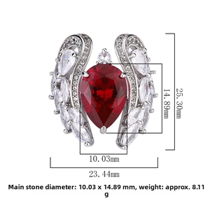 Macro view of pear-cut ruby ring with dimensions 10x14mm and side stone measurements