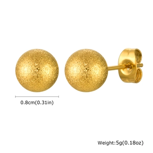 Detail view of 0.8cm gold ball stud earrings with matte sandblasted finish and metal back