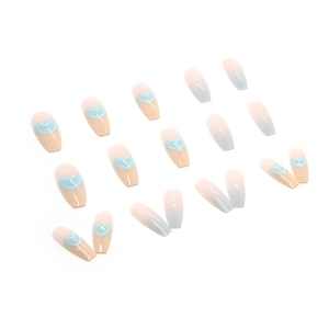 Long trapezoid press-on nails featuring light blue heart designs and cool gradient finish