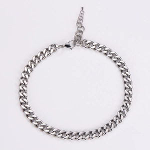 Detail of silver stainless steel Cuban chain necklace with lobster clasp and extender
