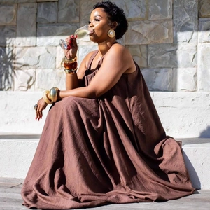 Women's brown sleeveless loose cotton linen maxi dress with pleated texture for summer