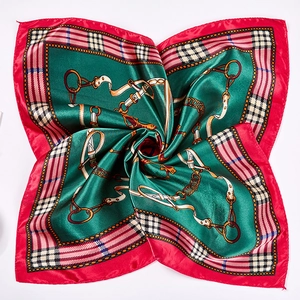 Satin square scarf featuring luxury chain and belt print in vibrant red and green colors