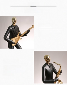 Détail de figurines de musique en résine durable avec finition noire et dorée peinte à main