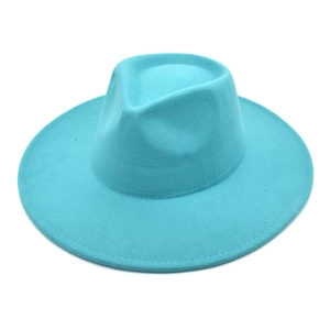 Detailed top view of a teal wool fedora hat with wide brim and reinforced stitching