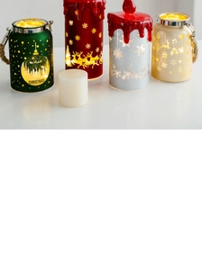 Row of festive Christmas metal lanterns with LED lights featuring reindeer and snowflakes