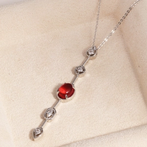 Elegant 18K gold-plated necklace with oval red gemstone and sparkling zircons for women