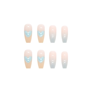 Long almond press-on nails with blue heart designs and nude to light blue gradient finish