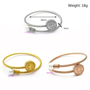 Adjustable steel cable bracelet with shell pearl and coin charm in three metallic tones