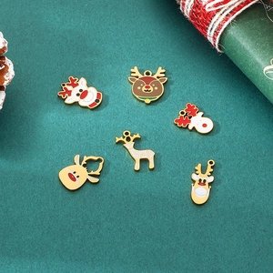 Detailed view of six gold-plated enamel reindeer charms for Christmas DIY jewelry making