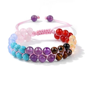 Detailed view of handmade double-layer woven bracelet with tiger eye stones and pink cord