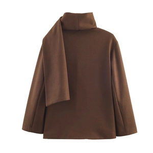 Detail of dark brown wool jacket featuring a unique built-in scarf collar design