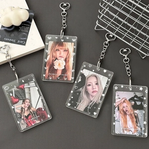Transparent acrylic photocard holders with glitter and metal heart keychains for K-pop cards