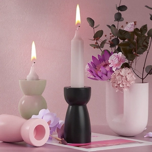 Modern geometric candle holders in Morandi tones shown in a cozy home lifestyle scene