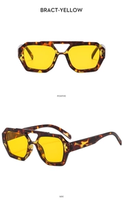 Detail view of double bridge aviator sunglasses with tortoise frame and yellow lenses
