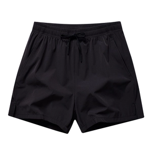Men's black quick-dry sports shorts with drawstring waist and side slits on white background