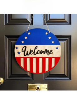 Close-up of wooden patriotic Welcome sign with rustic twine hanging on a dark door