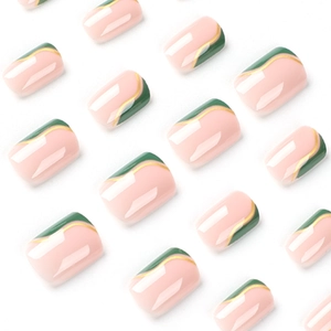 Short square press-on nails with green wave splice design and gold line accents