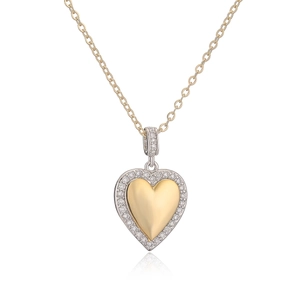 Two-tone heart pendant necklace with gold center and pavé zircon border on O-chain