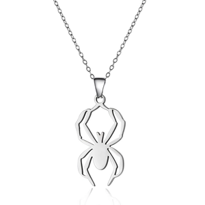 Macro shot of silver stainless steel spider necklace featuring polished hollow pendant