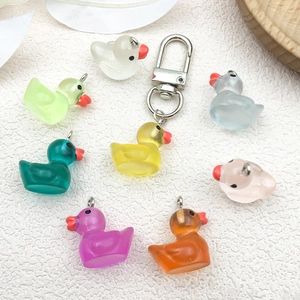 Luminous cartoon resin duck pendants with metal keyrings in multiple vibrant colors