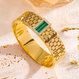 Vintage gold-plated honeycomb cuff bracelet with green stone and crystal inlay
