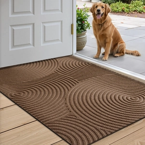 Brown anti-slip outdoor doormat with circular pattern and golden retriever at entrance