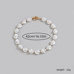 Detailed view of baroque pearl necklace with gold OT clasp showing 42cm length and 22g weight
