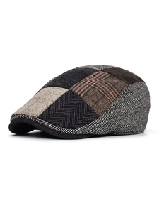 Detail of multi-color patchwork ivy cap featuring classic herringbone and plaid wool fabric