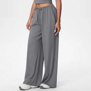 Detail of high-waist drawstring waistband on smooth wide-leg lounge pants for women