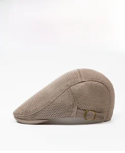Detail view of brown breathable mesh flat cap with adjustable bronze side buckle