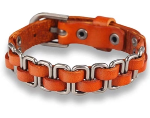 Detailed view of woven brown leather textures and metallic links on vintage bracelet